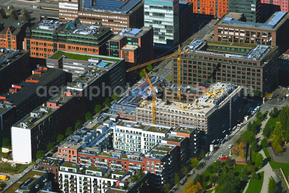 Aerial photograph Hamburg - Construction site for reconstruction and modernization and renovation of a building and construction of new building next at Kulturcompagnie on Shanghaiallee in the district HafenCity in Hamburg, Germany