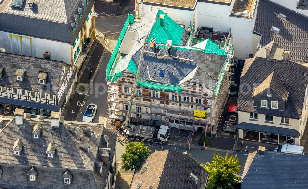 Brilon from above - Construction site for reconstruction and modernization and renovation of a building on Steinweg corner Springstrasse in Brilon in the state North Rhine-Westphalia, Germany