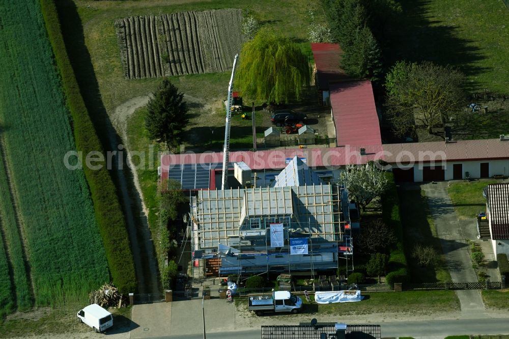 Mildenberg from the bird's eye view: Construction site for the modernization and renovation of a residential building on Muehlenweg in Mildenberg in the state of Brandenburg, Germany