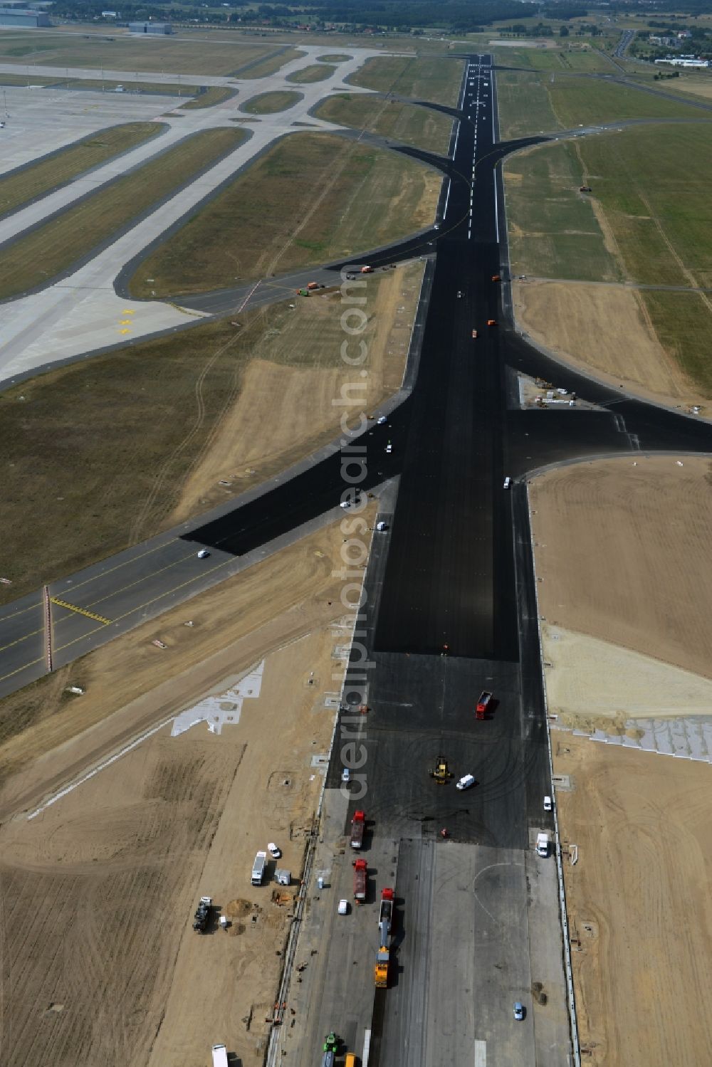 Schönefeld from the bird's eye view: Refurbishment locked Nordbahn - runway on the grounds of the airport in Schoenefeld in Brandenburg