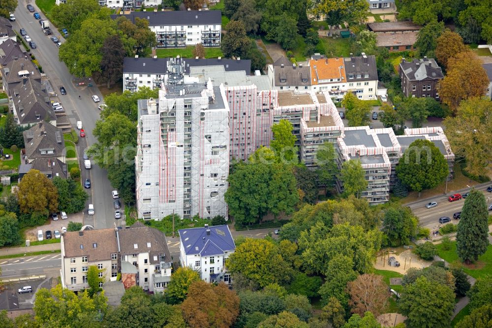 Aerial photograph Dortmund - Construction site for the renovation and modernization of the high-rise buildings in the residential area on Buergerstrasse in the district Hallerey in Dortmund at Ruhrgebiet in the state North Rhine-Westphalia, Germany