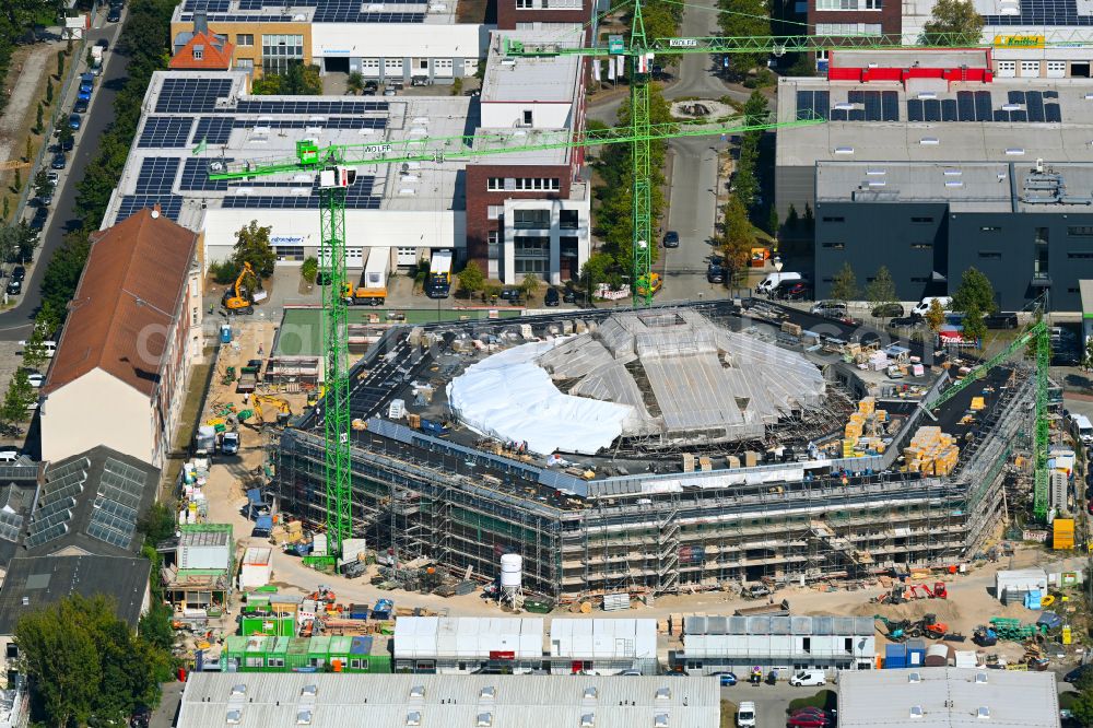 Potsdam from the bird's eye view: Construction site for reconstruction and modernization and renovation of a building of Rundschuppens and the alten Lokhalle in the district Babelsberg in Potsdam in the state Brandenburg, Germany