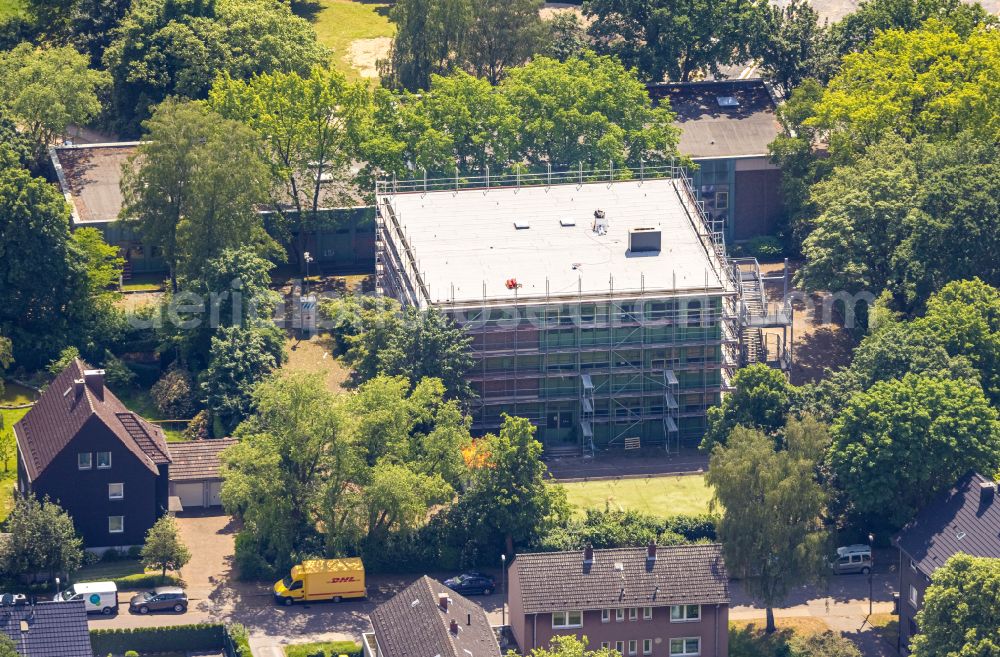 Herne from above - Construction site for the renovation and modernization of a daycare kindergarten on street Droegenkamp in Herne at Ruhrgebiet in the state North Rhine-Westphalia, Germany