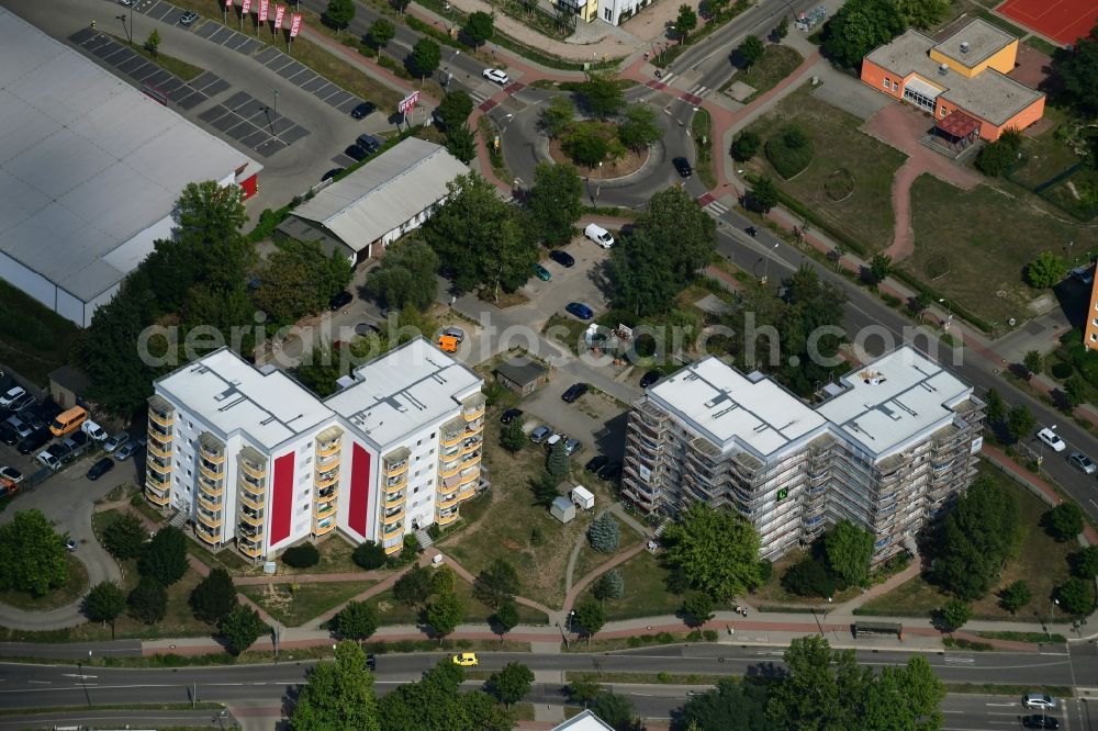 Teltow from above - Restoration and modernization of skyscrapers in the residential area of industrially manufactured settlement Mahlower corner Schoenower Strasse in Teltow in the state Brandenburg, Germany