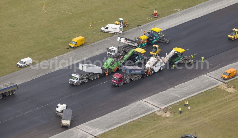 Büren from the bird's eye view: Rehabilitation of the start and runway of the airport Paderborn-Lippstadt (PAD) in Buren in the state of North Rhine-Westphalia