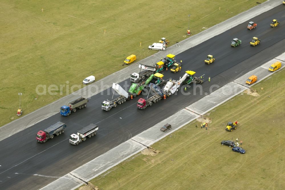 Büren from the bird's eye view: Rehabilitation of the start and runway of the airport Paderborn-Lippstadt (PAD) in Buren in the state of North Rhine-Westphalia