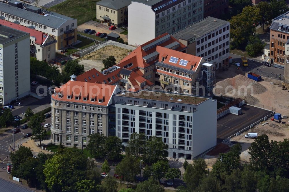 Aerial image Leipzig - Gutted buildings on the area of a former printing plant in Leipzig in the state Saxony. The old buildings are part of a housing project