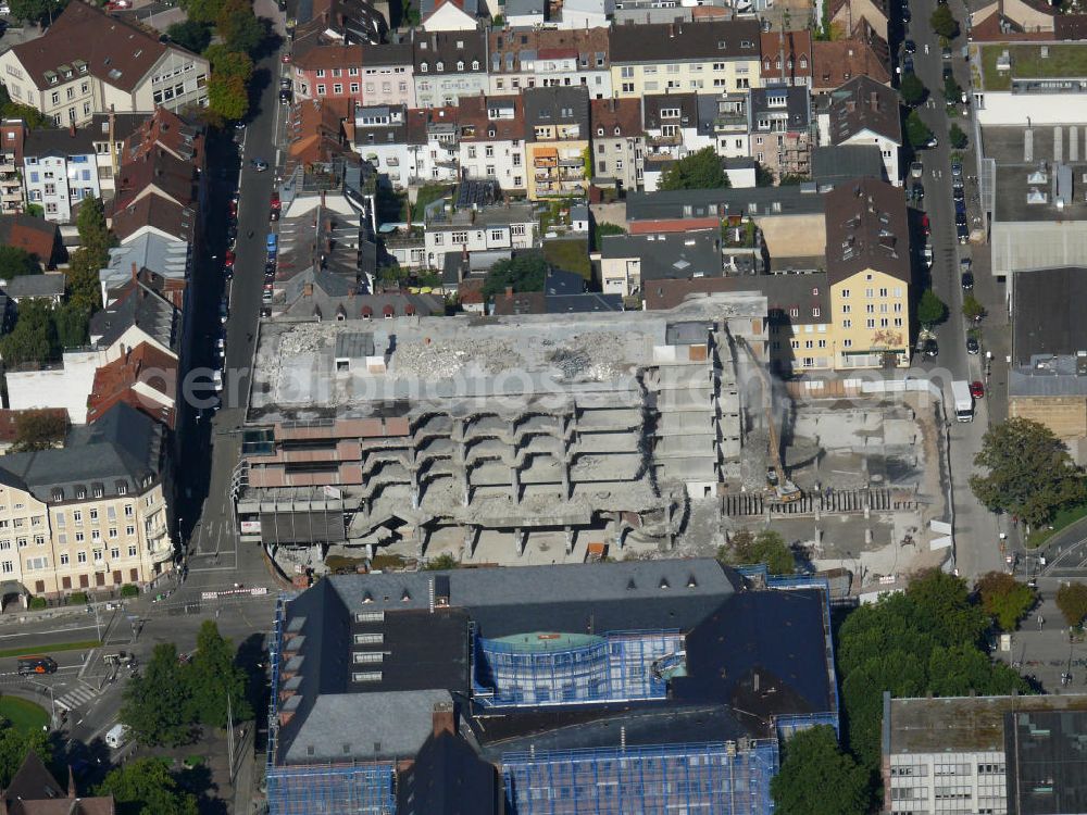 Freiburg im Breisgau from the bird's eye view: Umbau des Gebäudes der Universitätsbibliothek Freiburg, Baden-Württemberg. Nach Abschluß der Renovierung soll das Gebäude einem geschliffenen Diamant gleichen. Beauftragt mit den Arbeiten wurde das Architekturbüro Heinrich Degelo. Renovation of the university library building Freiburg, Baden-Wuerttemberg. After completion the building shall be akin to a diamond shape. The architectural office Heinrich Degelo has been charged with the building construction.