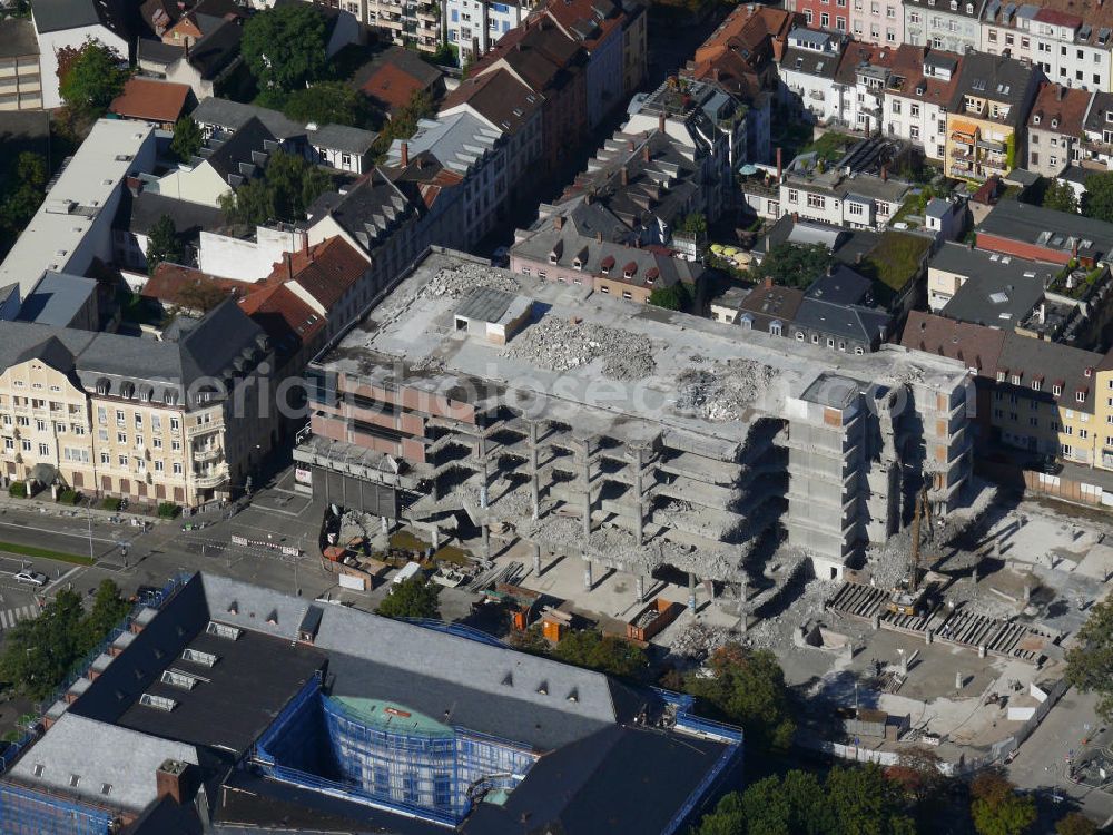 Aerial image Freiburg im Breisgau - Umbau des Gebäudes der Universitätsbibliothek Freiburg, Baden-Württemberg. Nach Abschluß der Renovierung soll das Gebäude einem geschliffenen Diamant gleichen. Beauftragt mit den Arbeiten wurde das Architekturbüro Heinrich Degelo. Renovation of the university library building Freiburg, Baden-Wuerttemberg. After completion the building shall be akin to a diamond shape. The architectural office Heinrich Degelo has been charged with the building construction.