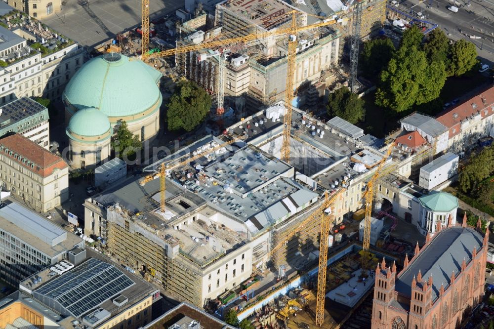 Aerial photograph Berlin - View of the reconstruction and renovation of the building of the Staatsoper Unter den Linden in Berlin at Bebelplatz. It is the oldest opera house and theater building in Berlin. A new building will serve as stacks and warehouse for the Staatsoper Komplex. The architect HG Merz is a overseeing the reconstruction of the historical building complex