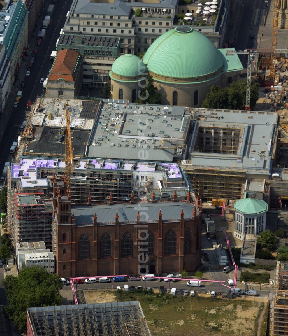 Aerial photograph Berlin - View of the reconstruction and renovation of the building of the Staatsoper Unter den Linden in Berlin at Bebelplatz. It is the oldest opera house and theater building in Berlin. A new building will serve as stacks and warehouse for the Staatsoper Komplex. The architect HG Merz is a overseeing the reconstruction of the historical building complex