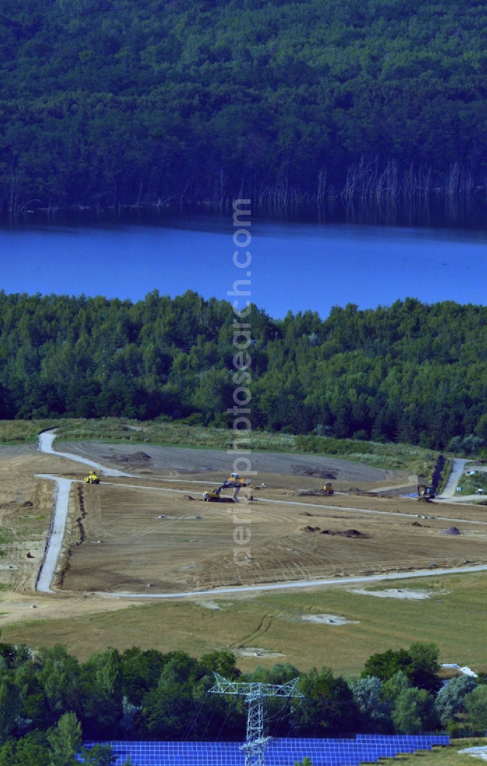 Zschornewitz from the bird's eye view: Remediation and reclamation work on the surface of the closed waste landfill Zschornewitz in Saxony-Anhalt