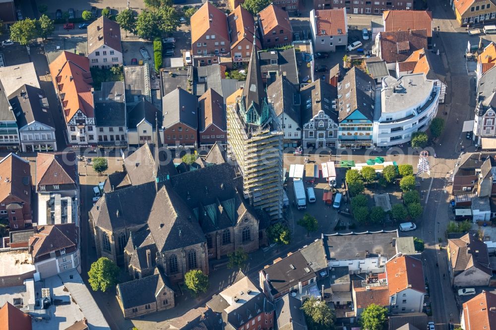 Ahlen from the bird's eye view: Construction site Tourist attraction of the historic monument of St. Marien Kirche on Marienplatz in Ahlen in the state North Rhine-Westphalia, Germany