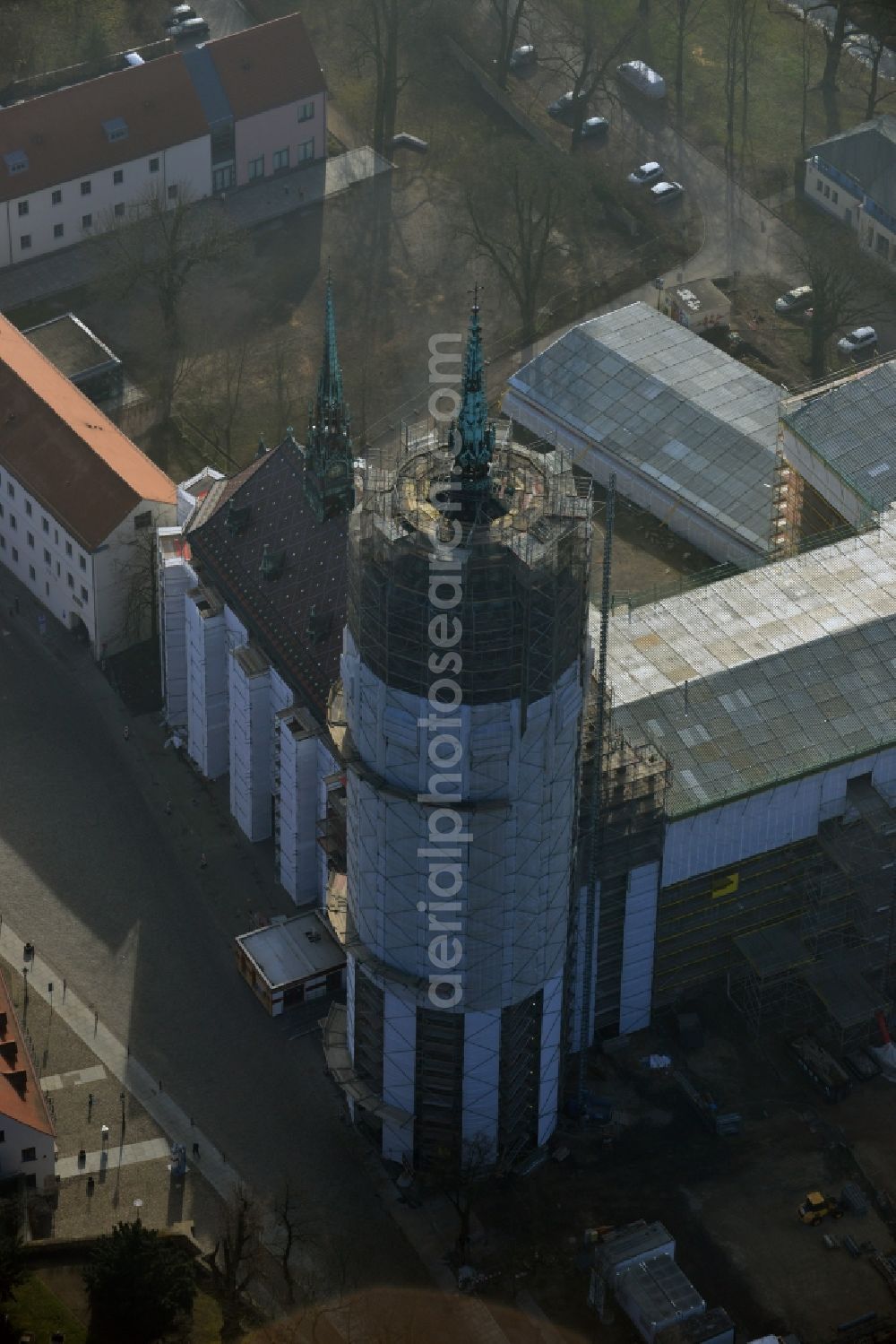 Wittenberg from above - View of the castle church of Wittenberg. The castle with its 88 m high Gothic tower at the west end of the town is a UNESCO World Heritage Site. The first mention of the castle dates from 1187. It gained fame as in 1517 the Wittenberg Augustinian monk and theology professor Martin Luther spread his 95 disputation