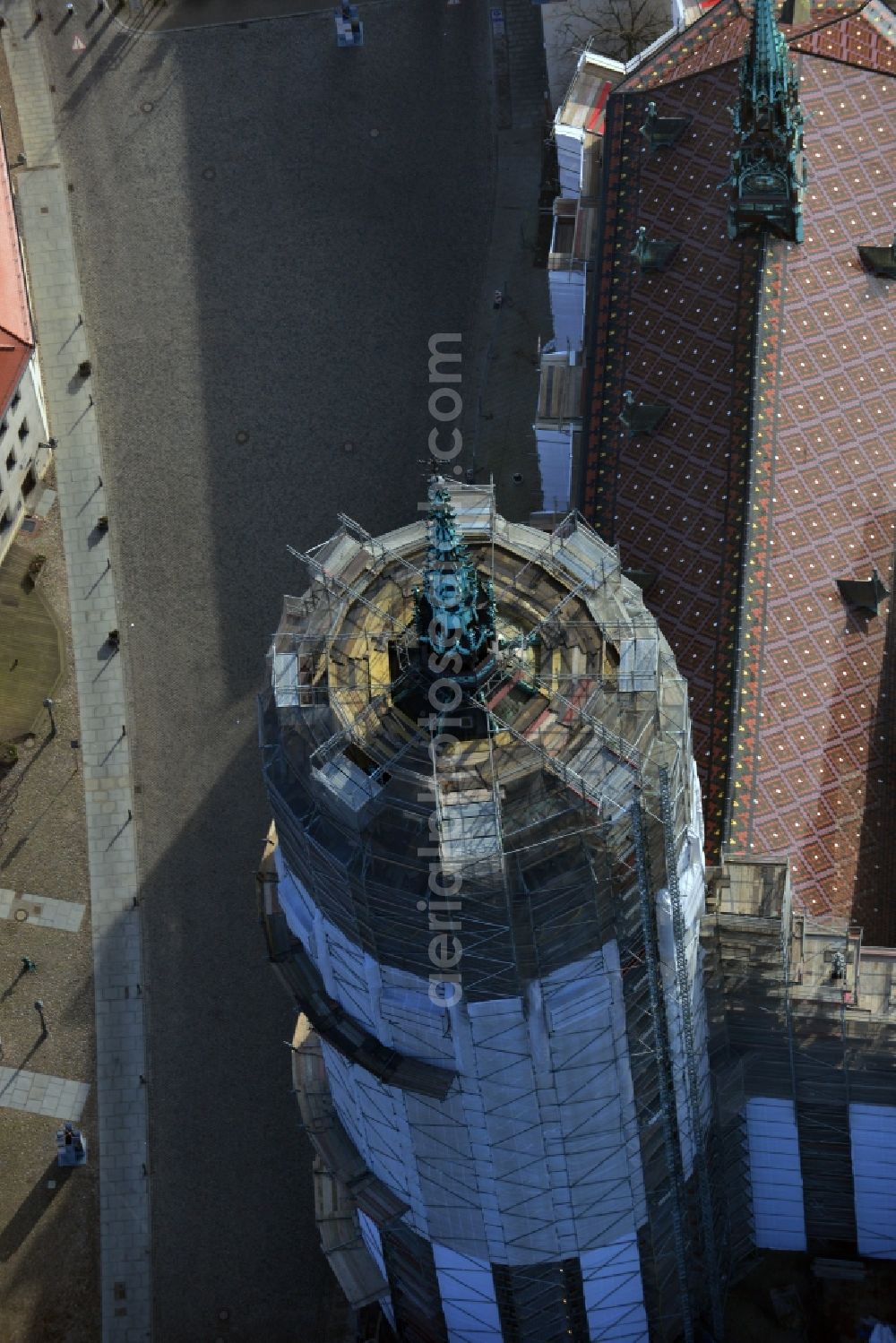 Aerial image Wittenberg - View of the castle church of Wittenberg. The castle with its 88 m high Gothic tower at the west end of the town is a UNESCO World Heritage Site. The first mention of the castle dates from 1187. It gained fame as in 1517 the Wittenberg Augustinian monk and theology professor Martin Luther spread his 95 disputation