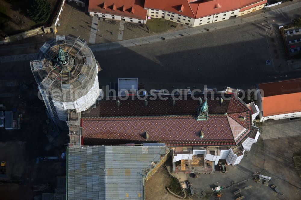 Aerial photograph Wittenberg - View of the castle church of Wittenberg. The castle with its 88 m high Gothic tower at the west end of the town is a UNESCO World Heritage Site. The first mention of the castle dates from 1187. It gained fame as in 1517 the Wittenberg Augustinian monk and theology professor Martin Luther spread his 95 disputation