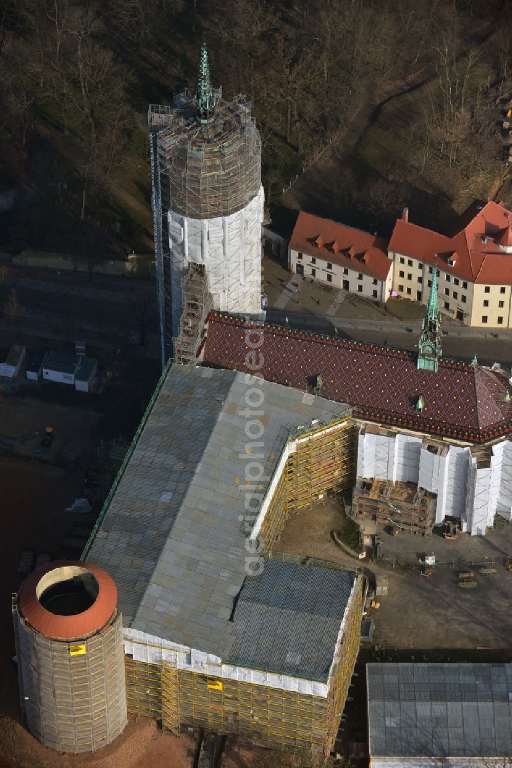 Wittenberg from above - View of the castle church of Wittenberg. The castle with its 88 m high Gothic tower at the west end of the town is a UNESCO World Heritage Site. The first mention of the castle dates from 1187. It gained fame as in 1517 the Wittenberg Augustinian monk and theology professor Martin Luther spread his 95 disputation