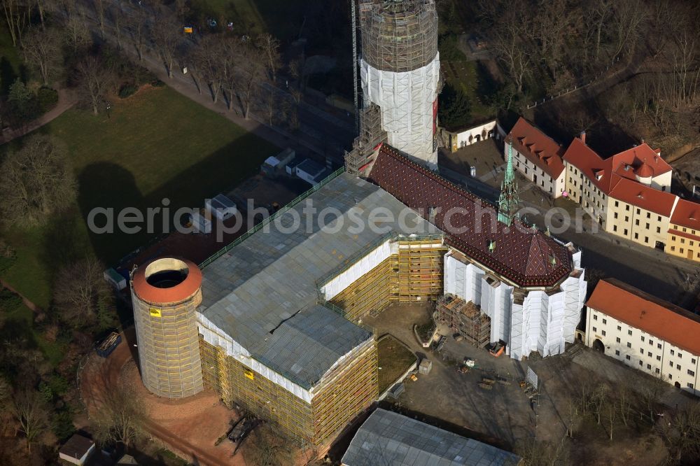 Wittenberg from the bird's eye view: View of the castle church of Wittenberg. The castle with its 88 m high Gothic tower at the west end of the town is a UNESCO World Heritage Site. The first mention of the castle dates from 1187. It gained fame as in 1517 the Wittenberg Augustinian monk and theology professor Martin Luther spread his 95 disputation