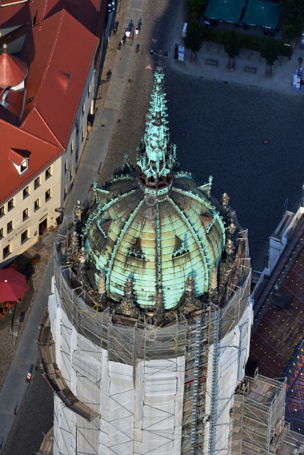 Aerial photograph Wittenberg - View of the castle church of Wittenberg. The castle with its 88 m high Gothic tower at the west end of the town is a UNESCO World Heritage Site. The first mention of the castle dates from 1187. It gained fame as in 1517 the Wittenberg Augustinian monk and theology professor Martin Luther spread his 95 disputation