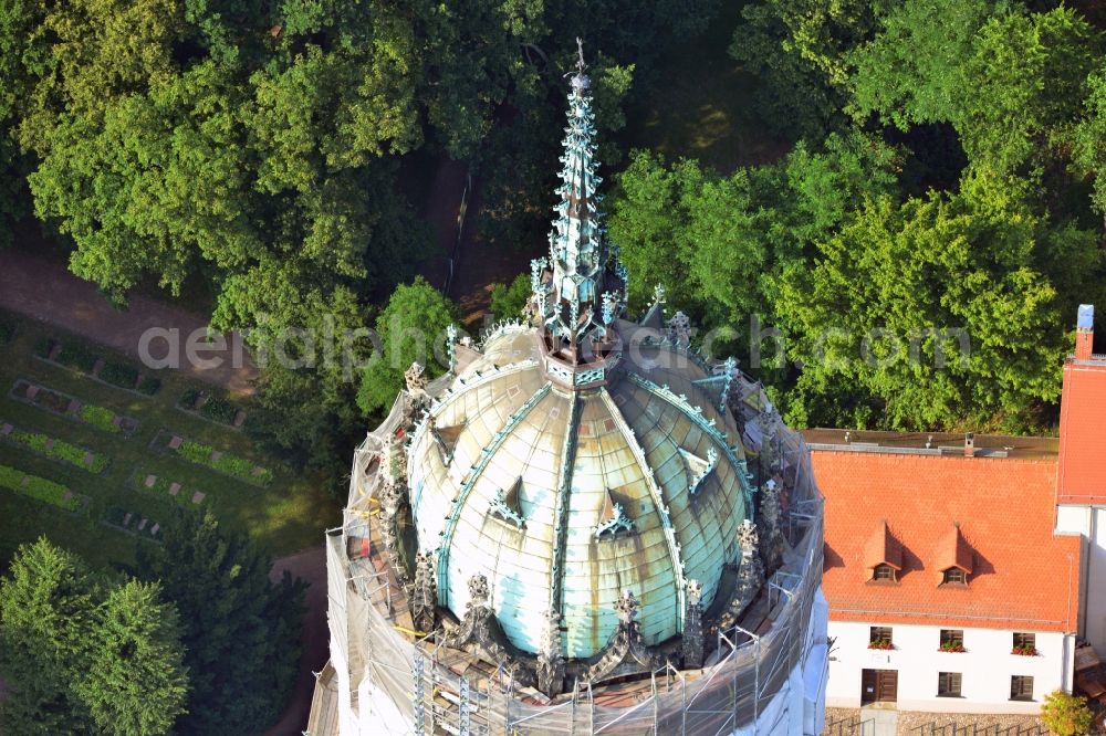 Aerial image Wittenberg - View of the castle church of Wittenberg. The castle with its 88 m high Gothic tower at the west end of the town is a UNESCO World Heritage Site. The first mention of the castle dates from 1187. It gained fame as in 1517 the Wittenberg Augustinian monk and theology professor Martin Luther spread his 95 disputation