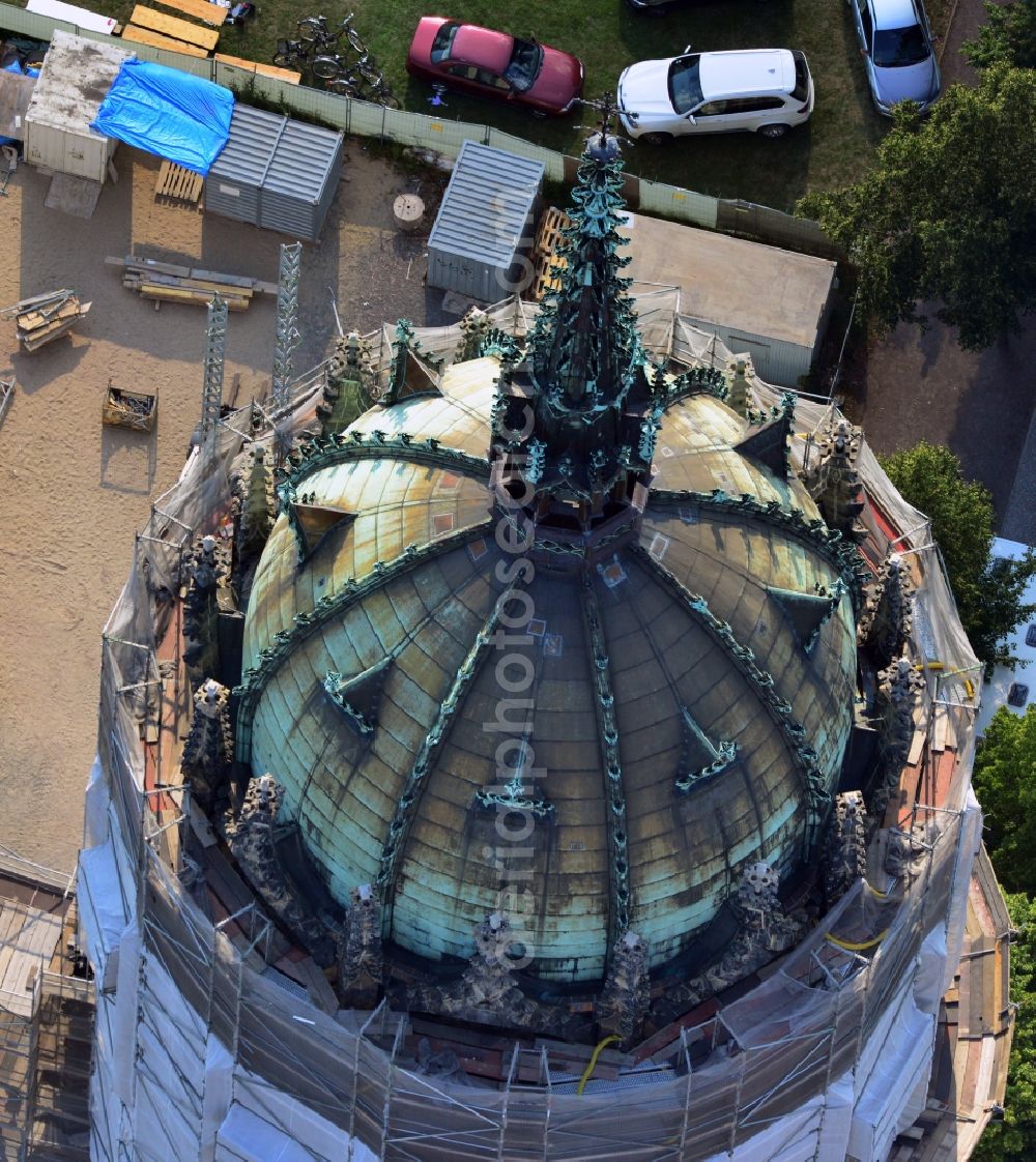 Aerial photograph Wittenberg - View of the castle church of Wittenberg. The castle with its 88 m high Gothic tower at the west end of the town is a UNESCO World Heritage Site. The first mention of the castle dates from 1187. It gained fame as in 1517 the Wittenberg Augustinian monk and theology professor Martin Luther spread his 95 disputation