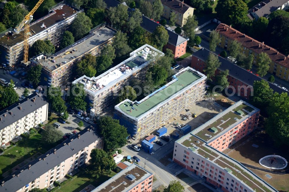 Aerial photograph München - Renovation and construction works on Rupertigaustrasse in Munich in the state of Bavaria. The original buildings from the 1940s are being energy-efficiently renovated and balconies are added