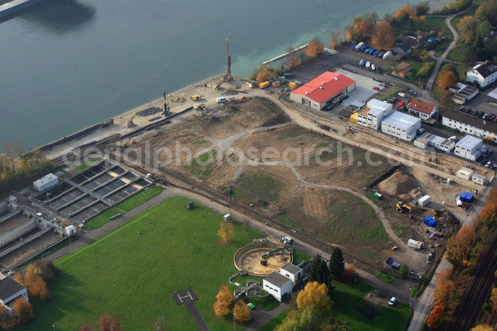 Grenzach-Wyhlen from above - Remediation at the site of the former wastewater treatment plant of the pharmaceutical company Roche in Grenzach-Wyhlen in Baden -Wuerttemberg. Construction of a temporary landing stage on the river Rhine for the removal of the excavated material