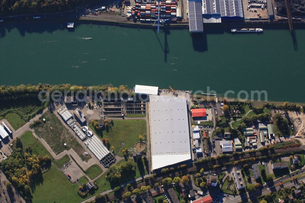 Grenzach-Wyhlen from above - Remediation at the site of the former wastewater treatment plant of the pharmaceutical company Roche in Grenzach-Wyhlen in Baden -Wuerttemberg. The temporary landing stage on the river Rhine is used for the removal of the excavated material