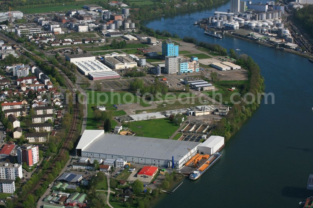 Aerial photograph Grenzach-Wyhlen - Remediation at the site of the former wastewater treatment plant of the pharmaceutical company Roche in Grenzach-Wyhlen in Baden -Wuerttemberg. The temporary landing stage on the river Rhine is used for the removal of the excavated material