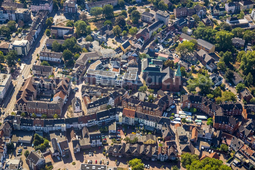 Aerial photograph Dinslaken - renovation works on the church building of the Katholische Kirchengemeinde St. Vincentius Dinslaken in the Old Town- center of downtown in Dinslaken in the state North Rhine-Westphalia, Germany