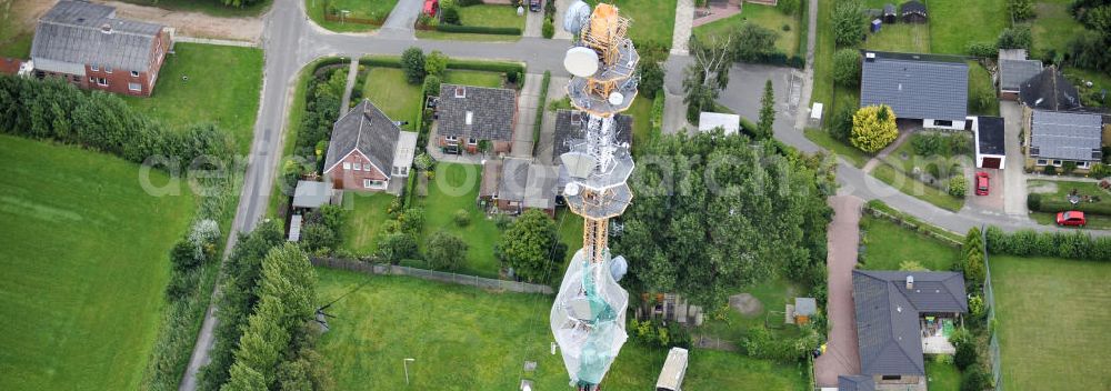 Aerial image Garding - Blick auf die Sanierungsarbeiten am Sendemast Garding auch bekannt als Fernsehsender Eiderstedt. Die Arbeiten werden ausgeführt durch die Firma Werner Diener GmbH & Co. Industrieanstrich KG. Restoration works on the broadcasting tower / transmitter mast Garding.