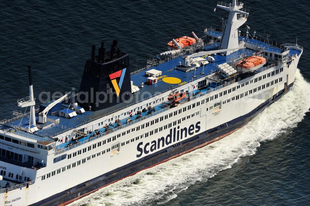 Aerial photograph ROSTOCK - WARNEMÜNDE - Blick auf die Scandlines Fähre Prins Joachim Korsor vor der Ostseeküste Warnemünde. Das unter dänischer Flagge fahrende Fährschiff Prins Joachim Korsør wurde 1980 durch die Reederei Scandlines in Dienst genommen. The Scandlines ferry Prins Joachim Korsor in front of Warnemünde Baltic Sea coast.