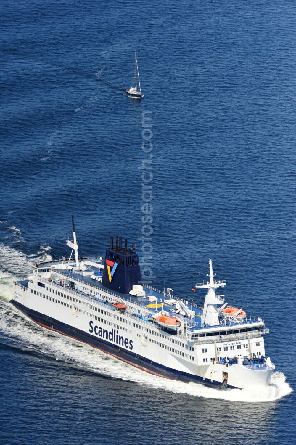 Aerial image ROSTOCK - WARNEMÜNDE - Blick auf die Scandlines Fähre Prins Joachim Korsor vor der Ostseeküste Warnemünde. Das unter dänischer Flagge fahrende Fährschiff Prins Joachim Korsør wurde 1980 durch die Reederei Scandlines in Dienst genommen. The Scandlines ferry Prins Joachim Korsor in front of Warnemünde Baltic Sea coast.