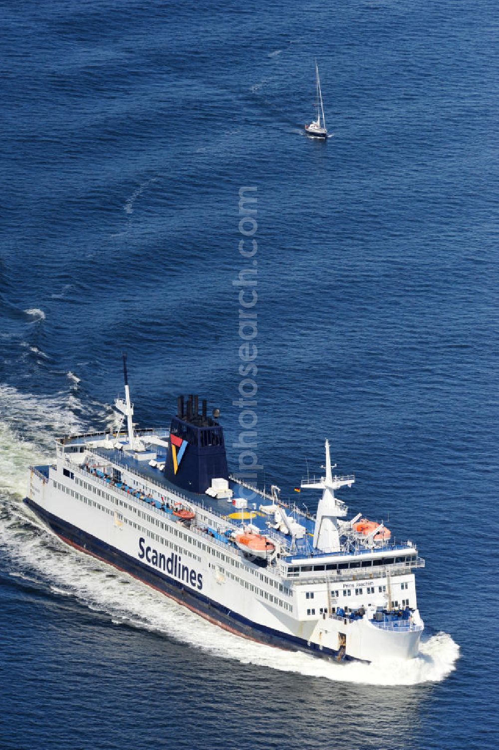 Aerial photograph ROSTOCK - WARNEMÜNDE - Blick auf die Scandlines Fähre Prins Joachim Korsor vor der Ostseeküste Warnemünde. Das unter dänischer Flagge fahrende Fährschiff Prins Joachim Korsør wurde 1980 durch die Reederei Scandlines in Dienst genommen. The Scandlines ferry Prins Joachim Korsor in front of Warnemünde Baltic Sea coast.