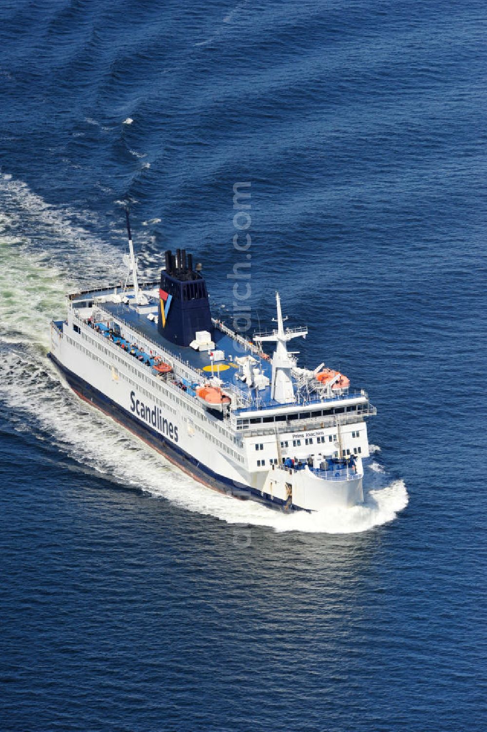 ROSTOCK - WARNEMÜNDE from above - Blick auf die Scandlines Fähre Prins Joachim Korsor vor der Ostseeküste Warnemünde. Das unter dänischer Flagge fahrende Fährschiff Prins Joachim Korsør wurde 1980 durch die Reederei Scandlines in Dienst genommen. The Scandlines ferry Prins Joachim Korsor in front of Warnemünde Baltic Sea coast.