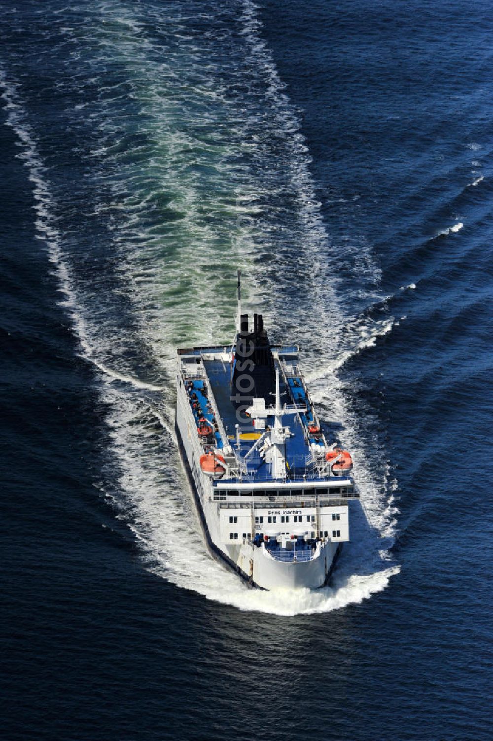 Aerial image ROSTOCK - WARNEMÜNDE - Blick auf die Scandlines Fähre Prins Joachim Korsor vor der Ostseeküste Warnemünde. Das unter dänischer Flagge fahrende Fährschiff Prins Joachim Korsør wurde 1980 durch die Reederei Scandlines in Dienst genommen. The Scandlines ferry Prins Joachim Korsor in front of Warnemünde Baltic Sea coast.