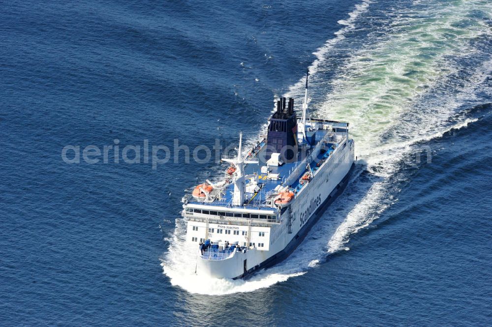 ROSTOCK - WARNEMÜNDE from the bird's eye view: Blick auf die Scandlines Fähre Prins Joachim Korsor vor der Ostseeküste Warnemünde. Das unter dänischer Flagge fahrende Fährschiff Prins Joachim Korsør wurde 1980 durch die Reederei Scandlines in Dienst genommen. The Scandlines ferry Prins Joachim Korsor in front of Warnemünde Baltic Sea coast.