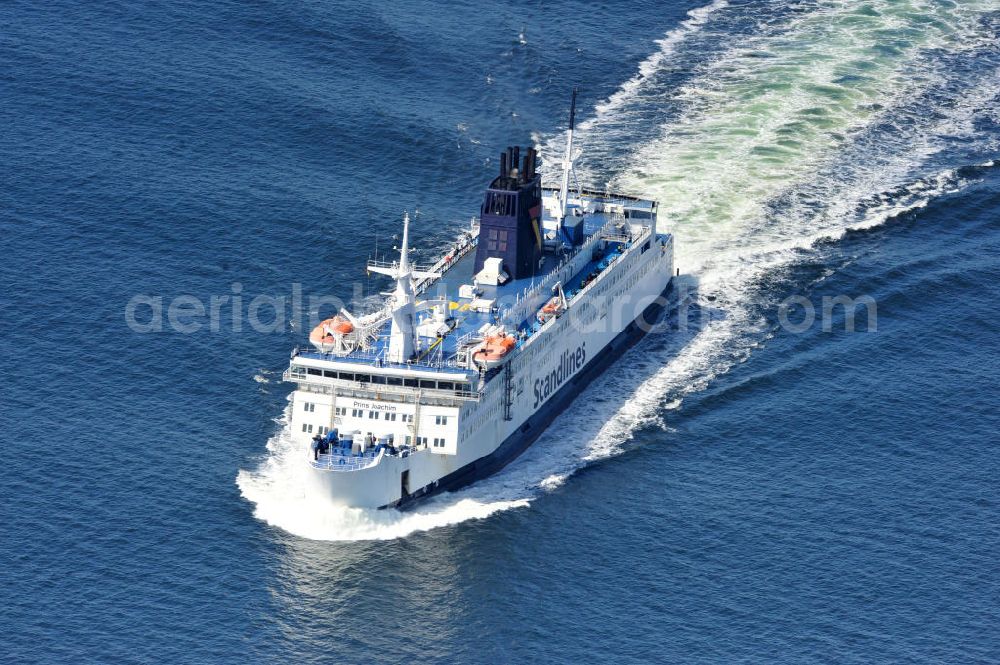 Aerial photograph ROSTOCK - WARNEMÜNDE - Blick auf die Scandlines Fähre Prins Joachim Korsor vor der Ostseeküste Warnemünde. Das unter dänischer Flagge fahrende Fährschiff Prins Joachim Korsør wurde 1980 durch die Reederei Scandlines in Dienst genommen. The Scandlines ferry Prins Joachim Korsor in front of Warnemünde Baltic Sea coast.