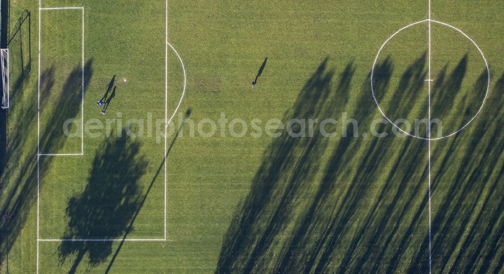 Haltern am See from the bird's eye view: Shadow - landscape of tree rows at a soccer ground in Haltern in the state of North Rhine-Westphalia NRW