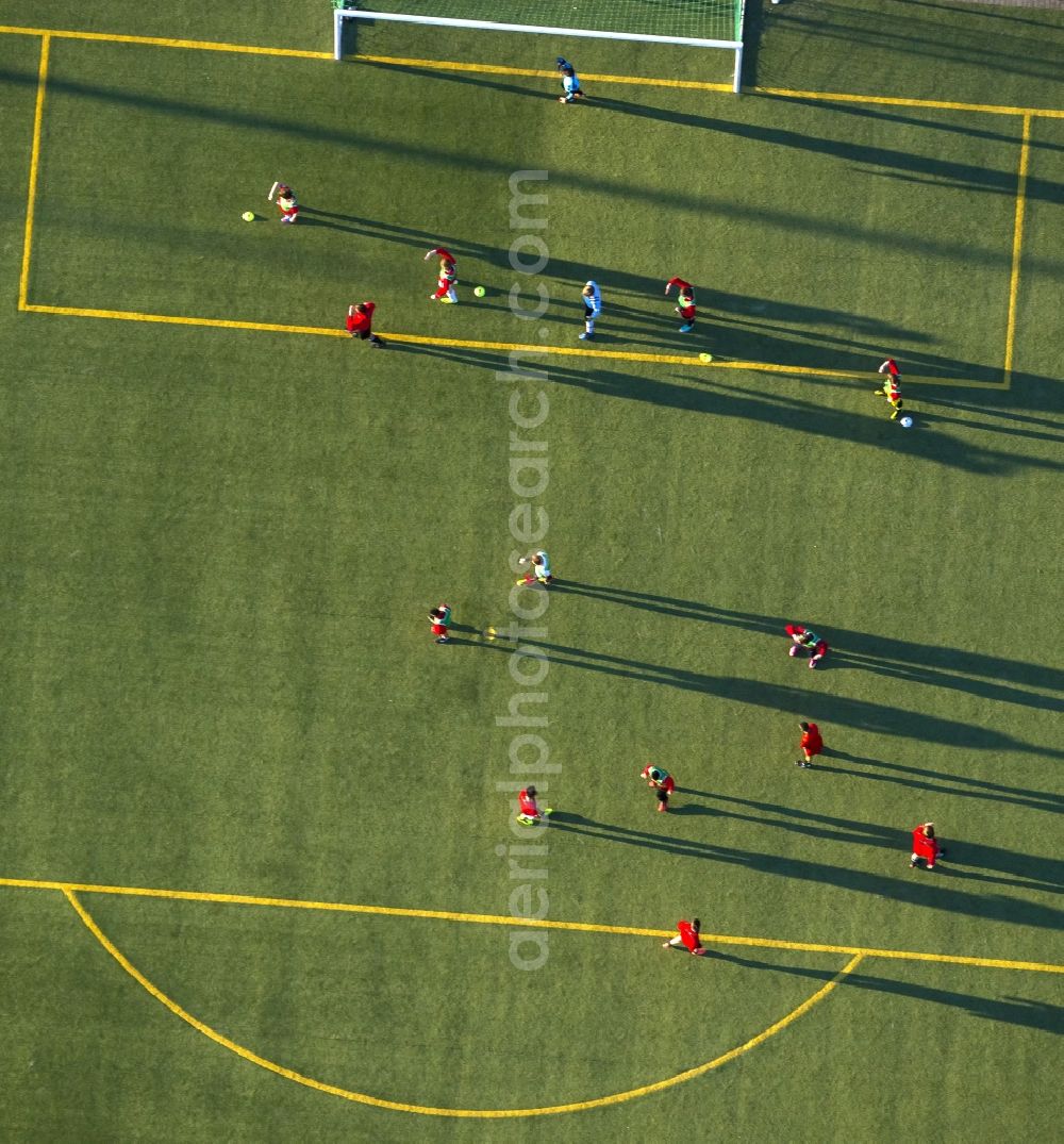 Aerial photograph Hamm - Shadow play at soccer practice on the sports field of HSV in Hamm in North Rhine-Westphalia