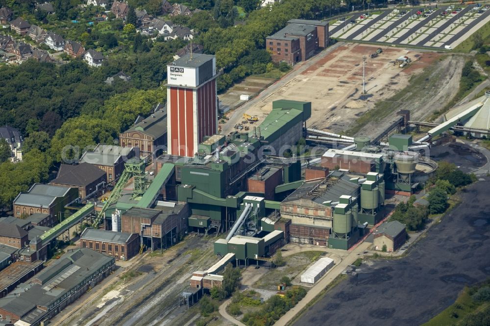 Aerial photograph Kamp-Lintfort - View of the pits I and II of the bill Friedrich Heinrich, today mine West. You can see the shaft I (big tower) and on the right the headframe of the shaft II. These RAG-West colliery belonging pit originated 1906th