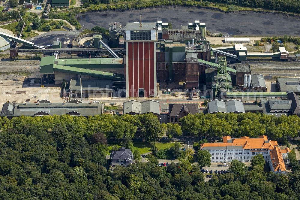 Aerial photograph Kamp-Lintfort - View of the pits I and II of the bill Friedrich Heinrich, today mine West. You can see the shaft I (big tower) and on the right the headframe of the shaft II. These RAG-West colliery belonging pit originated 1906th