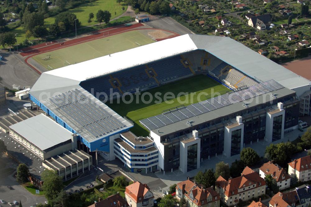 Aerial image Bielefeld - Die Schüco Arena, auch Bielefelder Alm oder Alm-Stadion genannt, im Grundbuch eingetragen als Stadion an der Melanchthonstraße, ist die Wettkampfstätte des Deutschen Sportclubs Arminia Bielefeld. Das Stadion an der Melanchthonstraße, dessen Namensrechte am 13. Januar 2004 an die Firma Schüco International KG vergeben wurden, bietet 27.300 Zuschauern Platz und ist im Besitz des Vereins, der es ohne öffentliche Zuschüsse betreibt. Kontakt DSC Arminia Bielefeld GmbH & Co. KGaA: Tel. +49(0)521 966 110, Email: kontakt@arminia-bielefeld.de; Kontakt Schüco International KG: Tel. +49(0)521 7830, Email: info@schueco.com