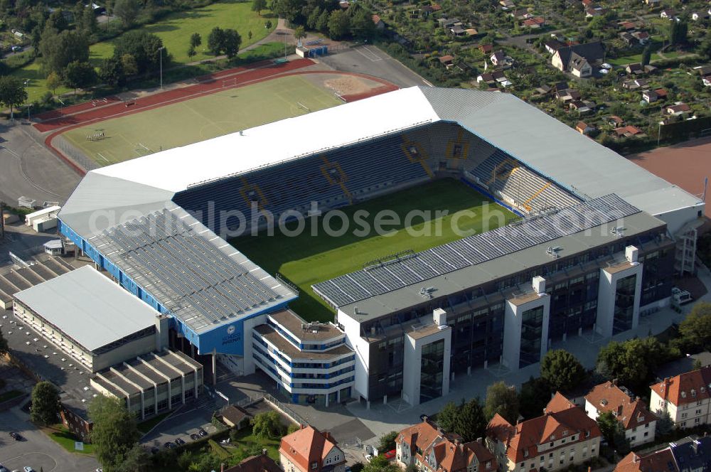 Aerial photograph Bielefeld - Die Schüco Arena, auch Bielefelder Alm oder Alm-Stadion genannt, im Grundbuch eingetragen als Stadion an der Melanchthonstraße, ist die Wettkampfstätte des Deutschen Sportclubs Arminia Bielefeld. Das Stadion an der Melanchthonstraße, dessen Namensrechte am 13. Januar 2004 an die Firma Schüco International KG vergeben wurden, bietet 27.300 Zuschauern Platz und ist im Besitz des Vereins, der es ohne öffentliche Zuschüsse betreibt. Kontakt DSC Arminia Bielefeld GmbH & Co. KGaA: Tel. +49(0)521 966 110, Email: kontakt@arminia-bielefeld.de; Kontakt Schüco International KG: Tel. +49(0)521 7830, Email: info@schueco.com