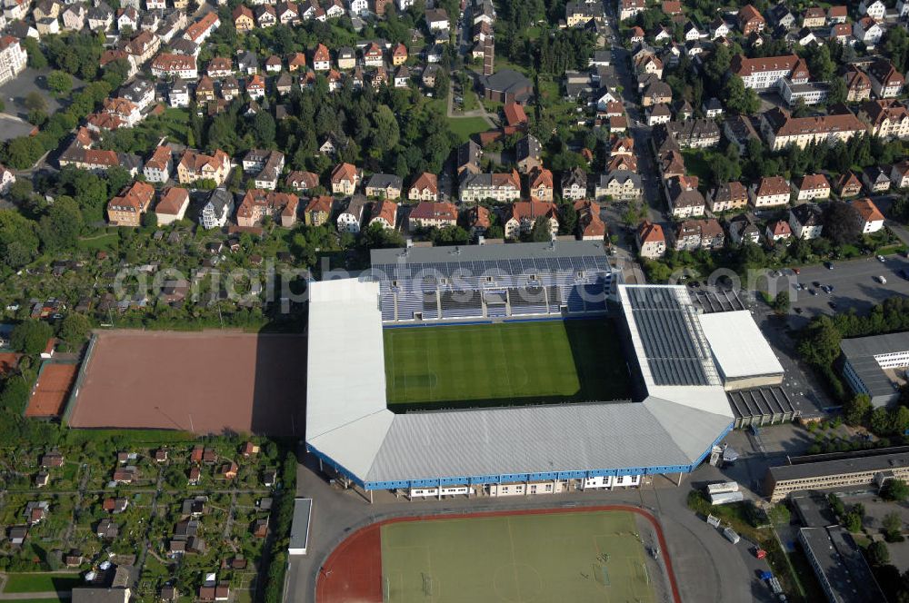 Aerial photograph Bielefeld - Die Schüco Arena, auch Bielefelder Alm oder Alm-Stadion genannt, im Grundbuch eingetragen als Stadion an der Melanchthonstraße, ist die Wettkampfstätte des Deutschen Sportclubs Arminia Bielefeld. Das Stadion an der Melanchthonstraße, dessen Namensrechte am 13. Januar 2004 an die Firma Schüco International KG vergeben wurden, bietet 27.300 Zuschauern Platz und ist im Besitz des Vereins, der es ohne öffentliche Zuschüsse betreibt. Kontakt DSC Arminia Bielefeld GmbH & Co. KGaA: Tel. +49(0)521 966 110, Email: kontakt@arminia-bielefeld.de; Kontakt Schüco International KG: Tel. +49(0)521 7830, Email: info@schueco.com