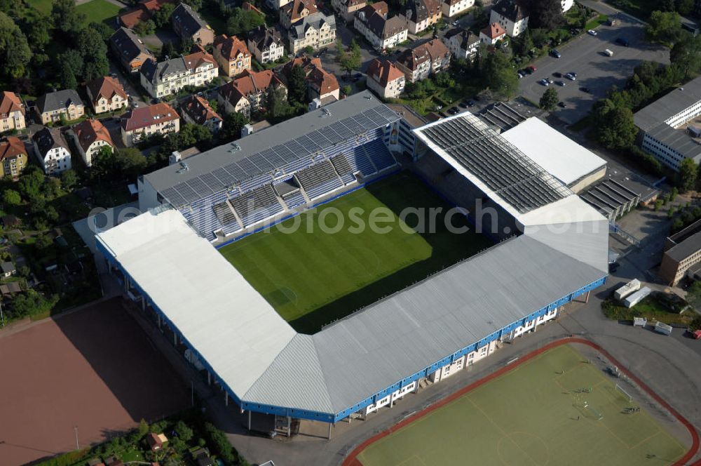 Bielefeld from the bird's eye view: Die Schüco Arena, auch Bielefelder Alm oder Alm-Stadion genannt, im Grundbuch eingetragen als Stadion an der Melanchthonstraße, ist die Wettkampfstätte des Deutschen Sportclubs Arminia Bielefeld. Das Stadion an der Melanchthonstraße, dessen Namensrechte am 13. Januar 2004 an die Firma Schüco International KG vergeben wurden, bietet 27.300 Zuschauern Platz und ist im Besitz des Vereins, der es ohne öffentliche Zuschüsse betreibt. Kontakt DSC Arminia Bielefeld GmbH & Co. KGaA: Tel. +49(0)521 966 110, Email: kontakt@arminia-bielefeld.de; Kontakt Schüco International KG: Tel. +49(0)521 7830, Email: info@schueco.com