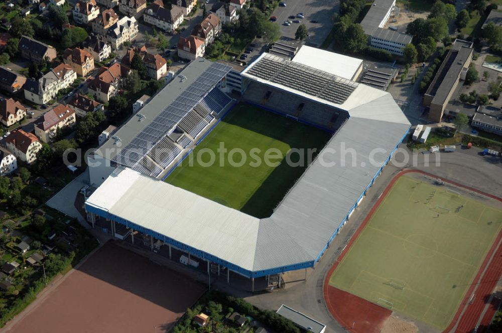 Aerial image Bielefeld - Die Schüco Arena, auch Bielefelder Alm oder Alm-Stadion genannt, im Grundbuch eingetragen als Stadion an der Melanchthonstraße, ist die Wettkampfstätte des Deutschen Sportclubs Arminia Bielefeld. Das Stadion an der Melanchthonstraße, dessen Namensrechte am 13. Januar 2004 an die Firma Schüco International KG vergeben wurden, bietet 27.300 Zuschauern Platz und ist im Besitz des Vereins, der es ohne öffentliche Zuschüsse betreibt. Kontakt DSC Arminia Bielefeld GmbH & Co. KGaA: Tel. +49(0)521 966 110, Email: kontakt@arminia-bielefeld.de; Kontakt Schüco International KG: Tel. +49(0)521 7830, Email: info@schueco.com