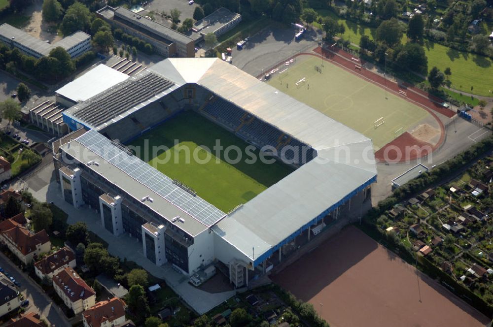 Aerial image Bielefeld - Die Schüco Arena, auch Bielefelder Alm oder Alm-Stadion genannt, im Grundbuch eingetragen als Stadion an der Melanchthonstraße, ist die Wettkampfstätte des Deutschen Sportclubs Arminia Bielefeld. Das Stadion an der Melanchthonstraße, dessen Namensrechte am 13. Januar 2004 an die Firma Schüco International KG vergeben wurden, bietet 27.300 Zuschauern Platz und ist im Besitz des Vereins, der es ohne öffentliche Zuschüsse betreibt. Kontakt DSC Arminia Bielefeld GmbH & Co. KGaA: Tel. +49(0)521 966 110, Email: kontakt@arminia-bielefeld.de; Kontakt Schüco International KG: Tel. +49(0)521 7830, Email: info@schueco.com