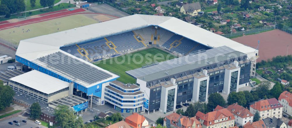 Aerial photograph Bielefeld - Die Schüco Arena, auch Bielefelder Alm oder Alm-Stadion genannt, im Grundbuch eingetragen als Stadion an der Melanchthonstraße, ist die Wettkampfstätte des Deutschen Sportclubs Arminia Bielefeld. Das Stadion an der Melanchthonstraße. The Schüco Arena / Stadium Bielefeld.