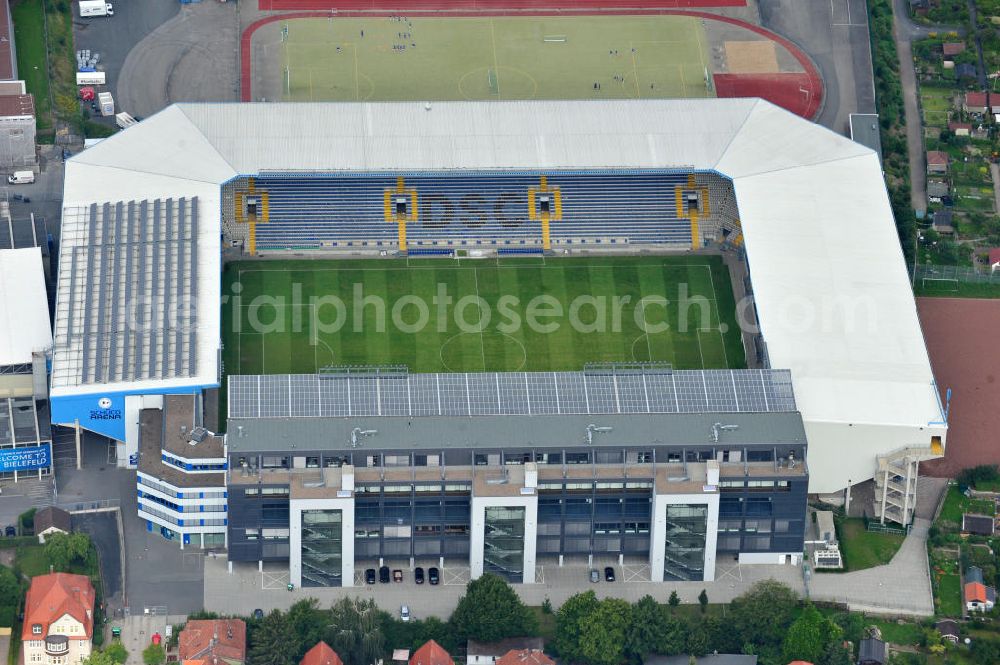 Bielefeld from above - Die Schüco Arena, auch Bielefelder Alm oder Alm-Stadion genannt, im Grundbuch eingetragen als Stadion an der Melanchthonstraße, ist die Wettkampfstätte des Deutschen Sportclubs Arminia Bielefeld. Das Stadion an der Melanchthonstraße. The Schüco Arena / Stadium Bielefeld.